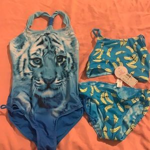 Two blue “Justice” super cute bathing suits!